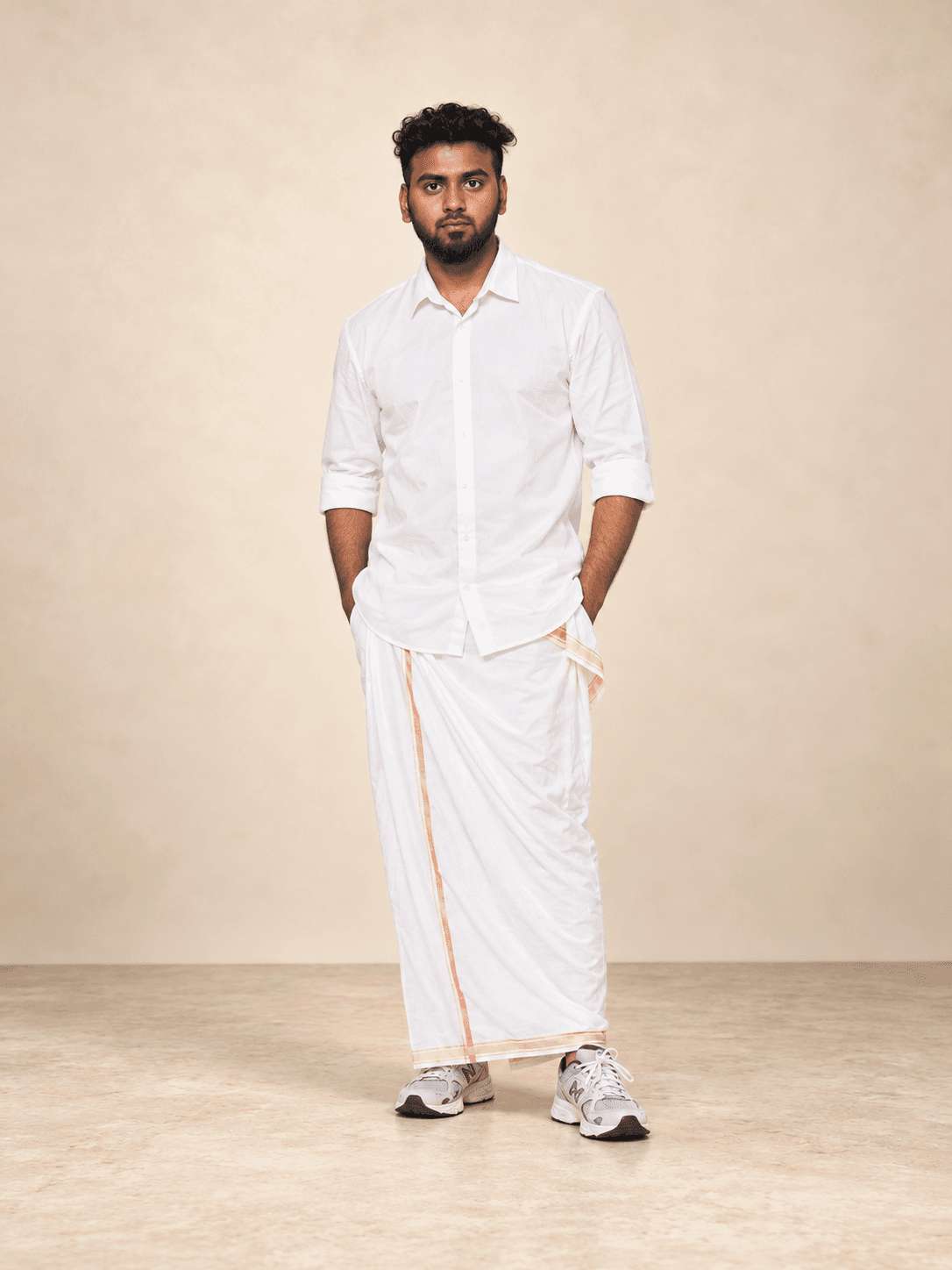 White shirt and traditional veshti